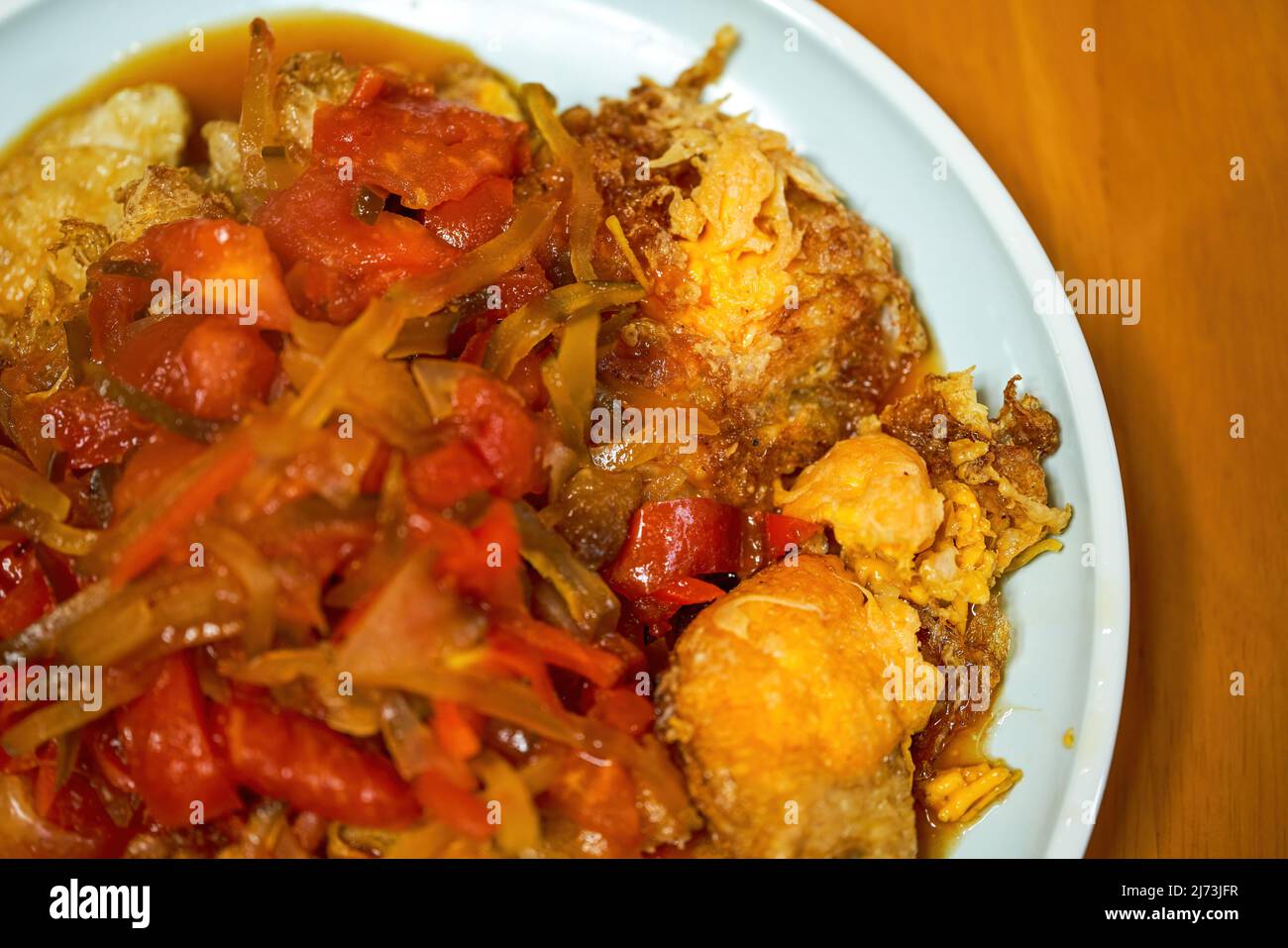 A delicious Chinese homestyle dish, fried eggs with five willows Stock