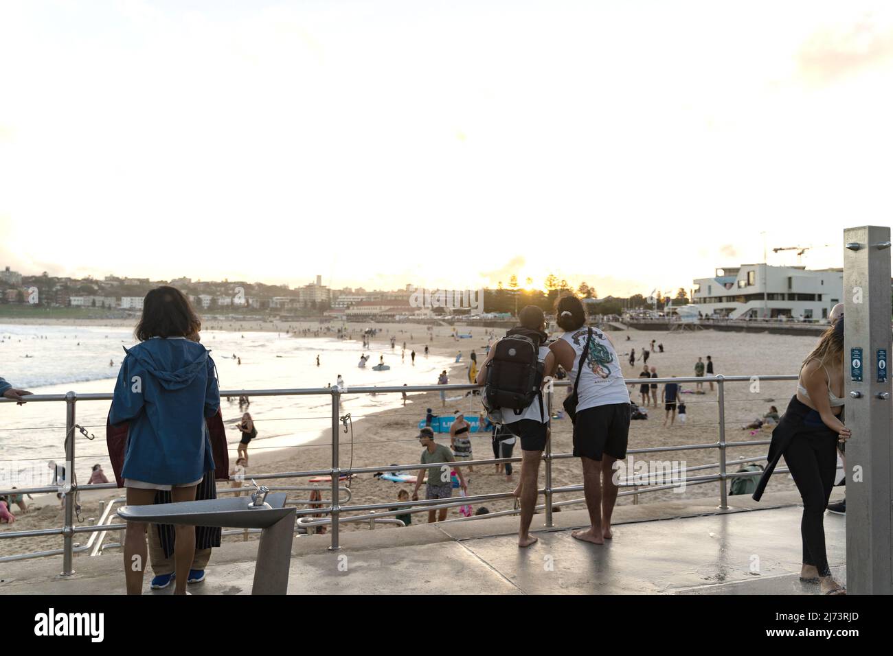 Crowd of young people at the beach Stock Photo