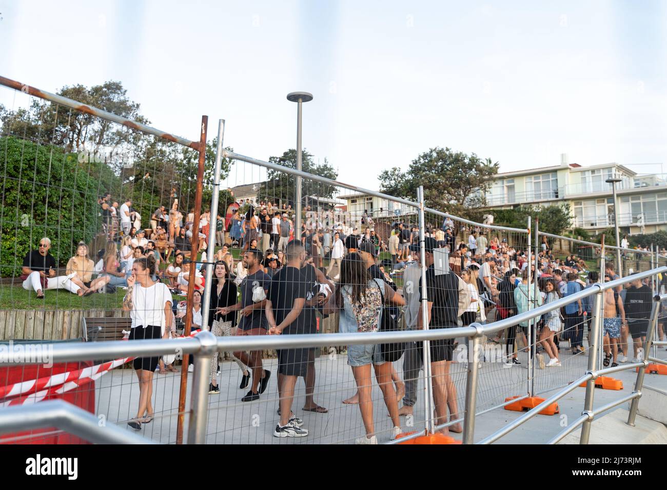 Crowd of young people at the beach Stock Photo