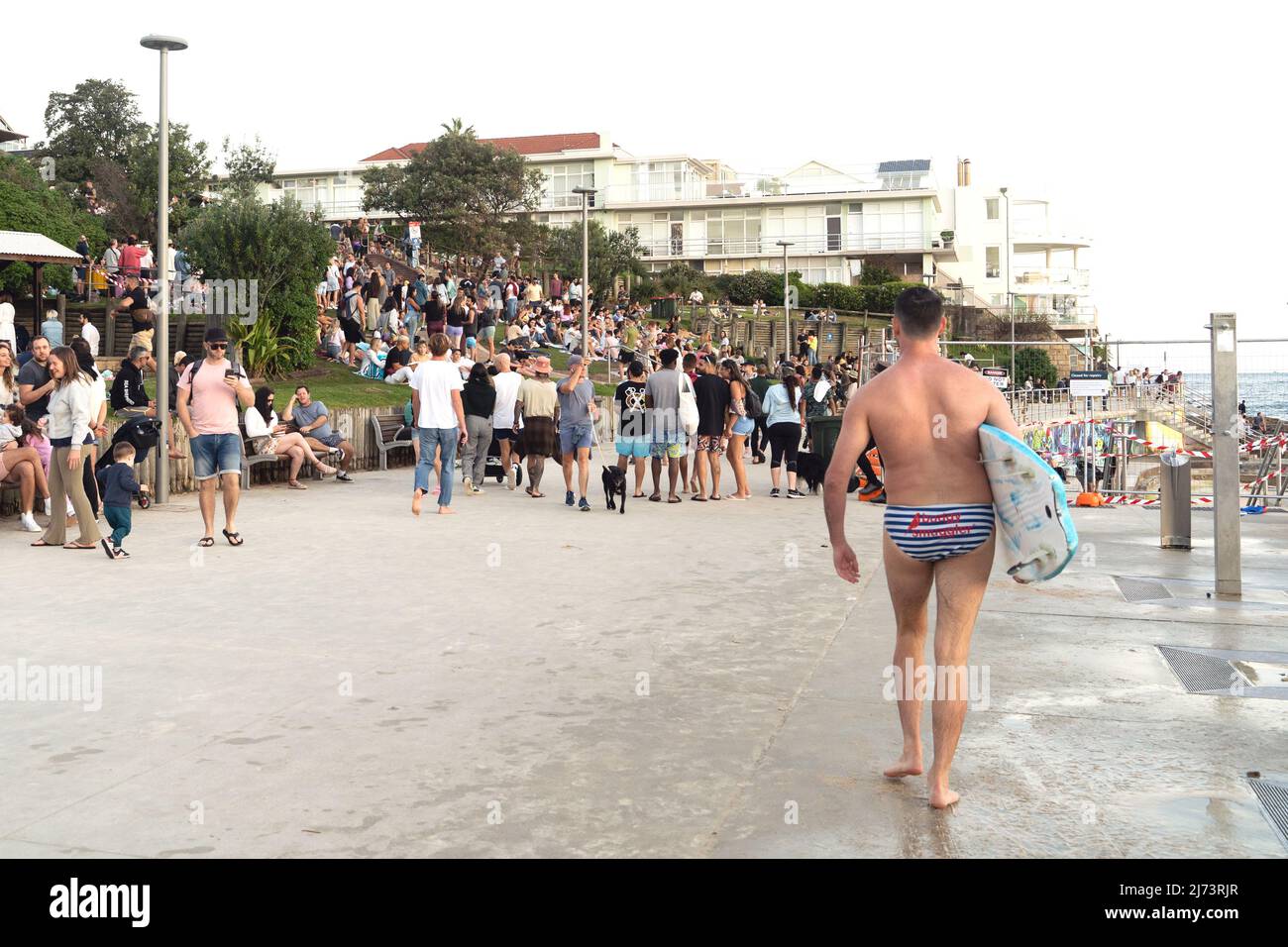 Crowd of young people at the beach Stock Photo