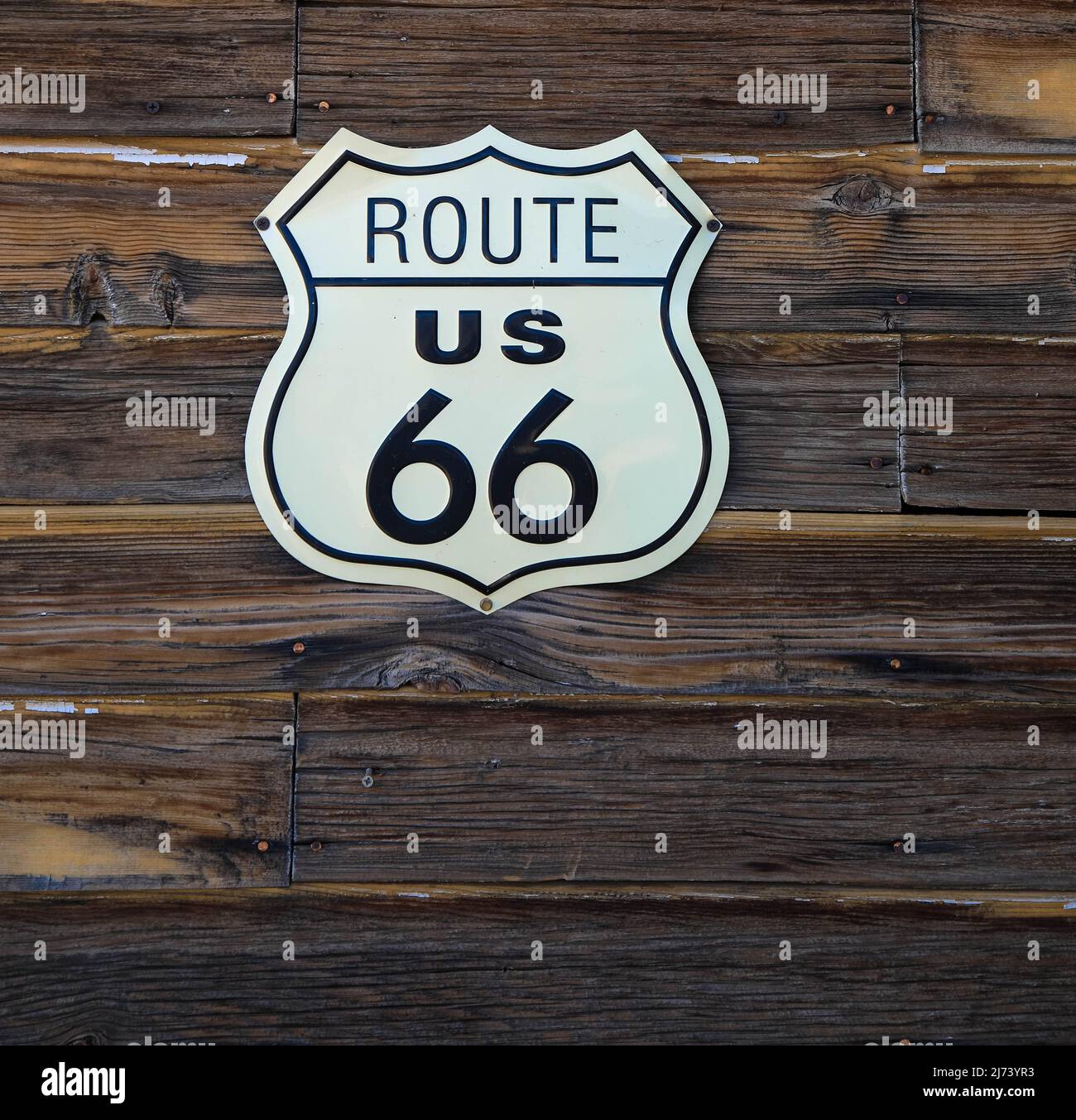 Historic rustic Route 66 sign on wooden board, close up. Arizona ...
