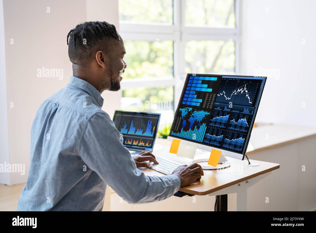 African American Business Data Analyst Man Using Computer Stock Photo