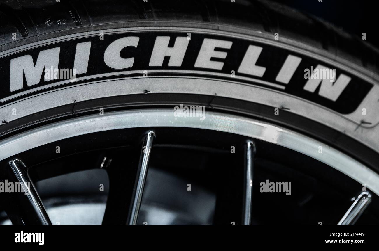 04 May 2022, Baden-Wuerttemberg, Villingen-Schwenningen: The logo of the French tire manufacturer Michelin can be seen on a Porsche Panamera Turbo S e-hybrid at a car dealership. Photo: Silas Stein/ Stock Photo