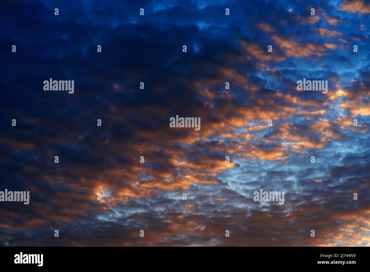 Clouds with sunlight in the sky Stock Photo - Alamy