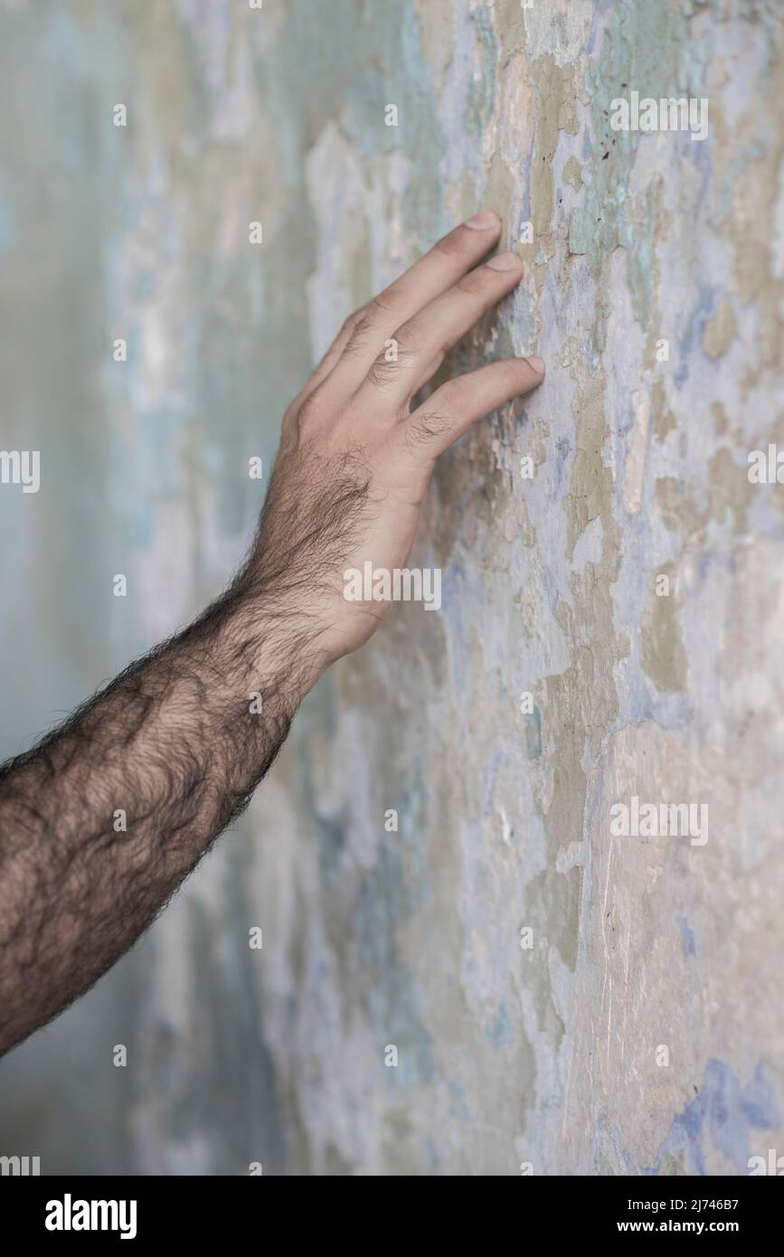 Touching the wall hi-res stock photography and images - Alamy