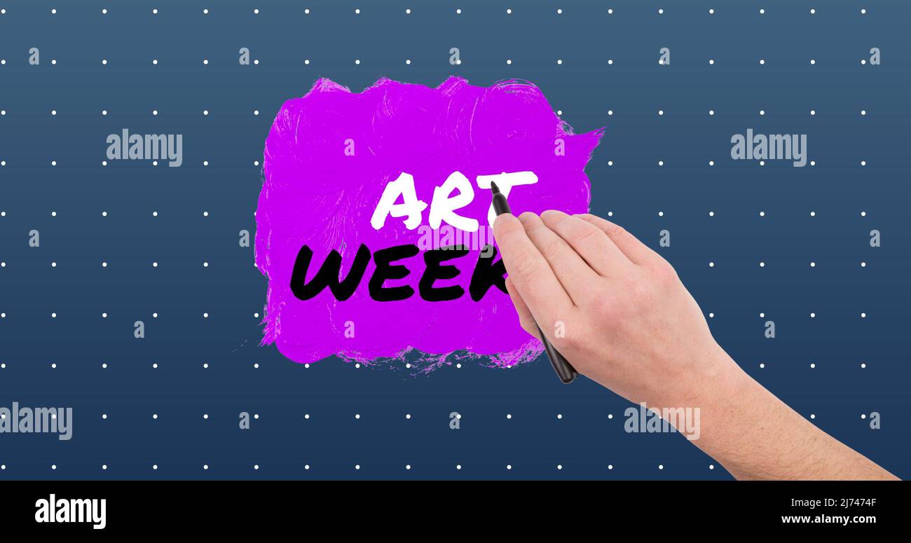 Cropped hand of caucasian man with felt tip pen over art week text on spotted background Stock Photo