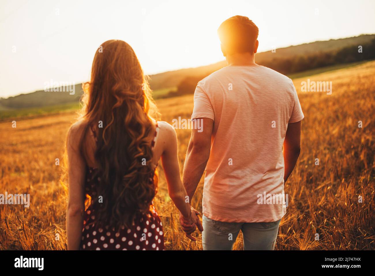 Girl guy holding hands walking hi-res stock photography and images - Alamy