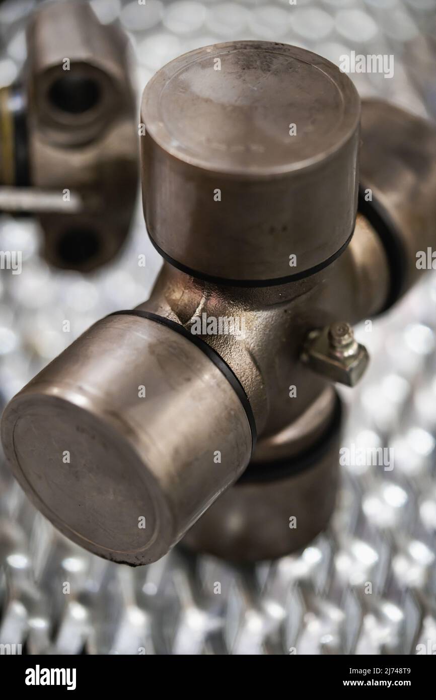 Cross of the cardan drive shaft, part of the car's transmission Stock