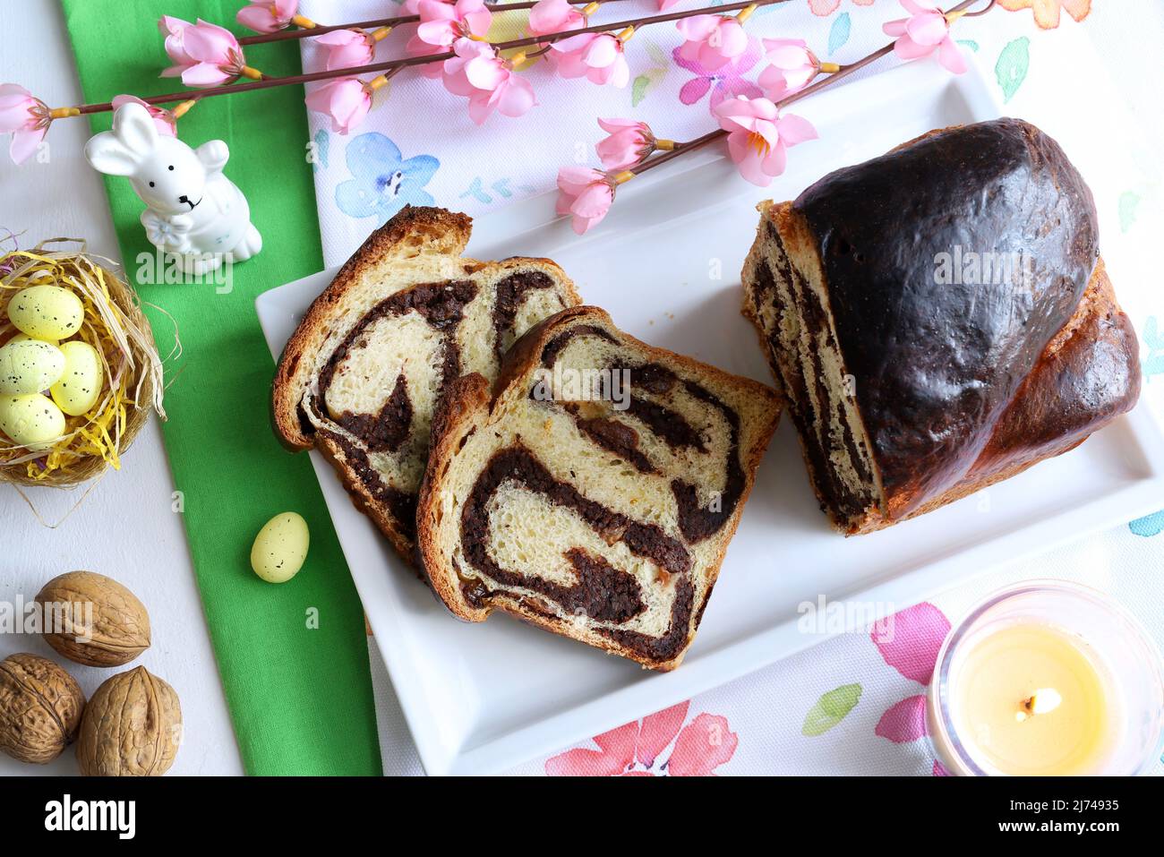 Cozonac - homemade traditional sweet bread for Easter. Easter decoration. Directly above. Stock Photo