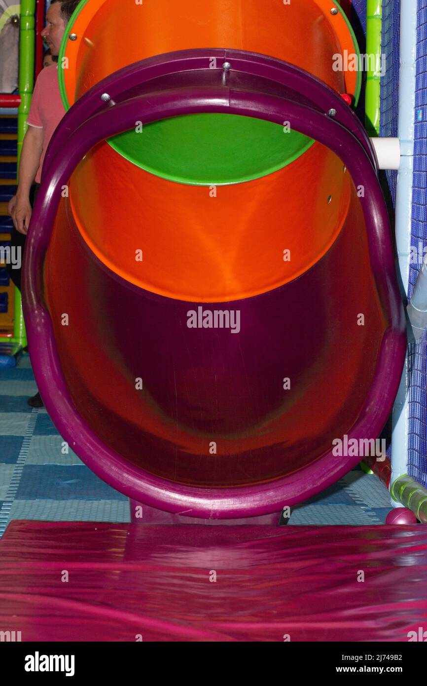 Tube slide on playground Stock Photo Alamy