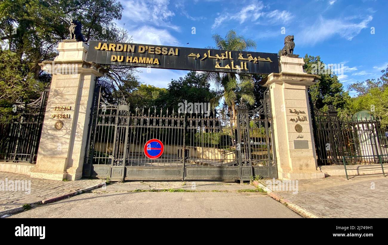 Zoo building and visitors in Botanical test Garden of Hamma Algiers.Established in 1832 and now still considered one of the most important botanical Stock Photo