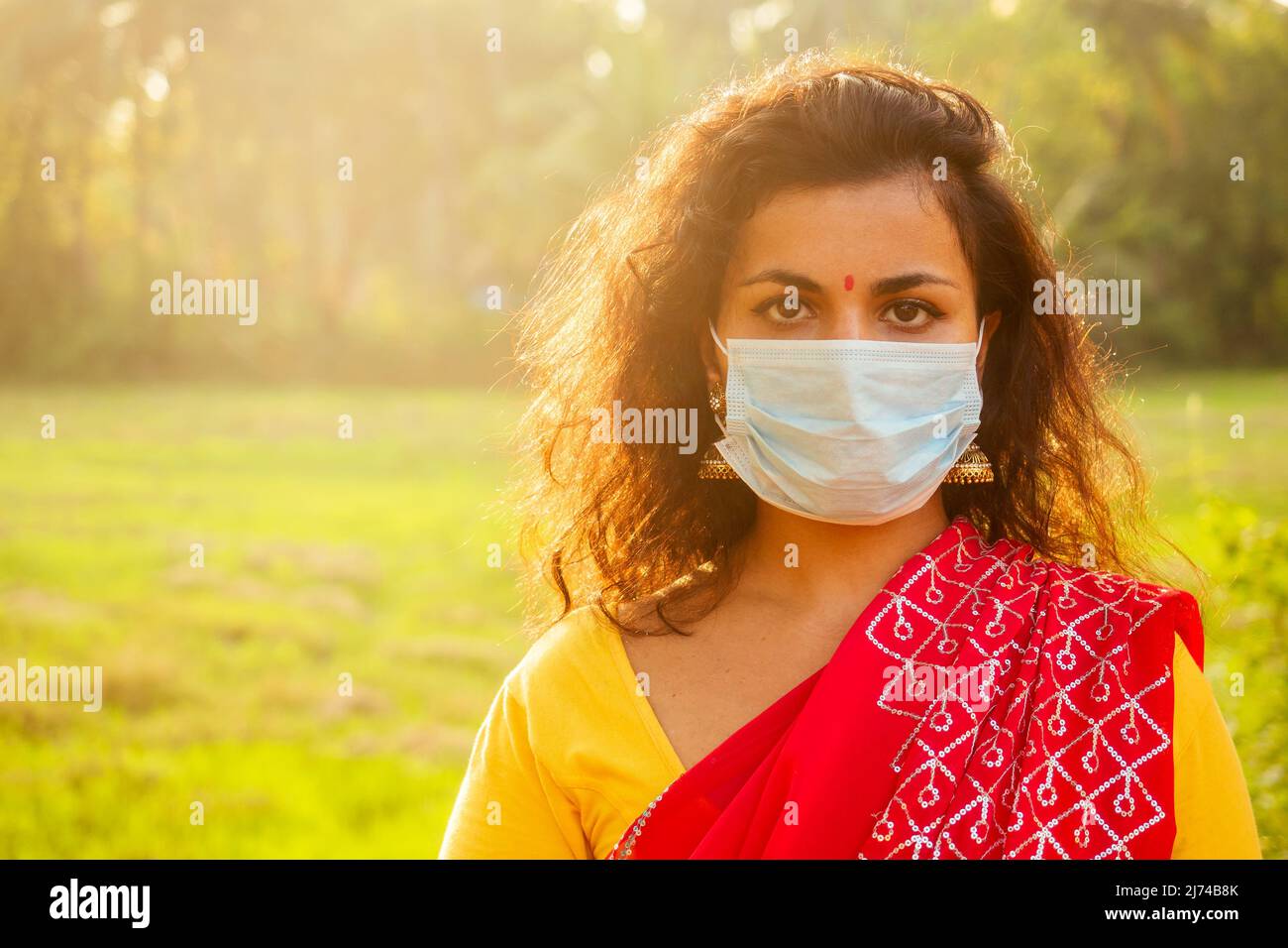portrait of a young indian woman wearing mask. the concept of tourism