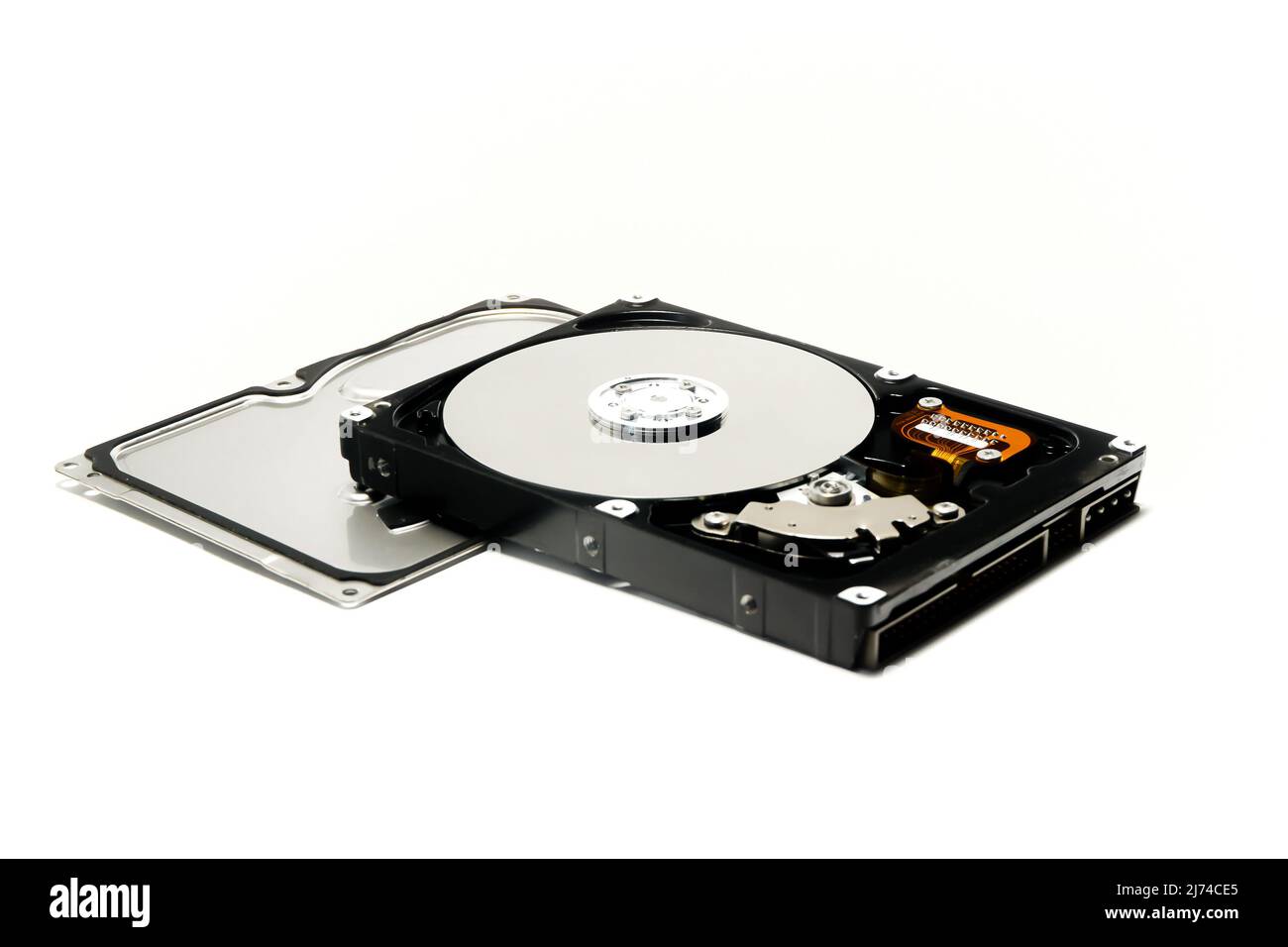 Open hard drive isolated on white background. Computer storage device