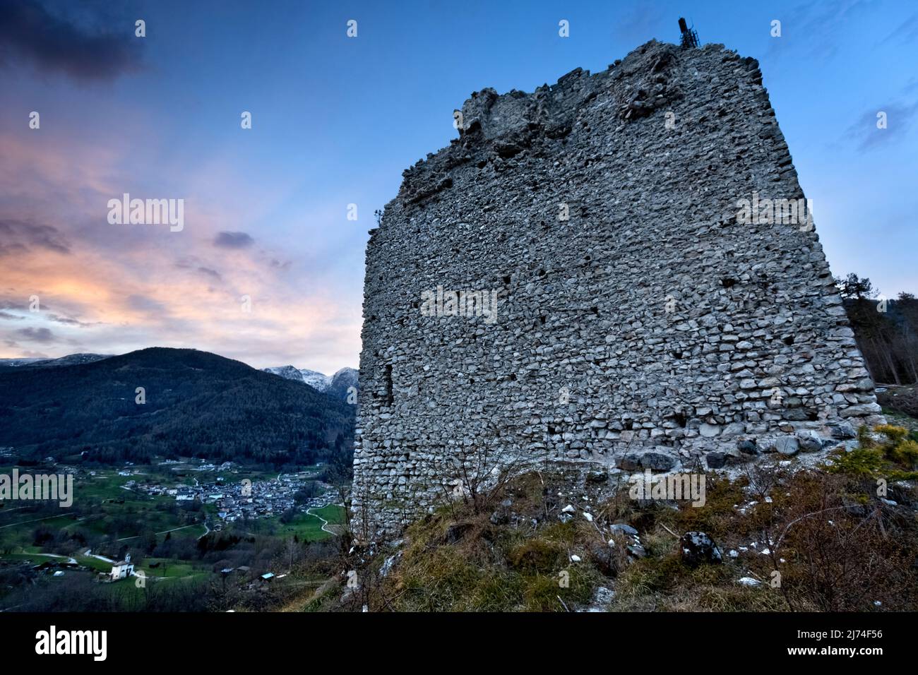 San Pietro castle in Torcegno: the superseded walls of the imposing fortress on Mount Ciolino. Valsugana, Trento province, Trentino Alto-Adige, Italy. Stock Photo