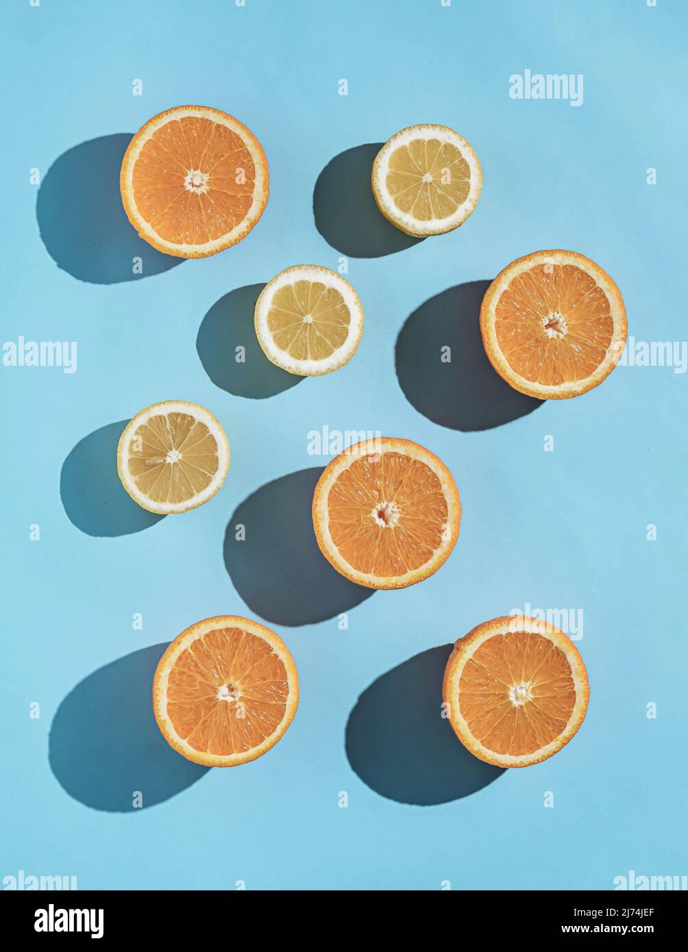 Pattern summer fruits orange and lemon fresh and sunny color. Minimal trend concept. Stock Photo