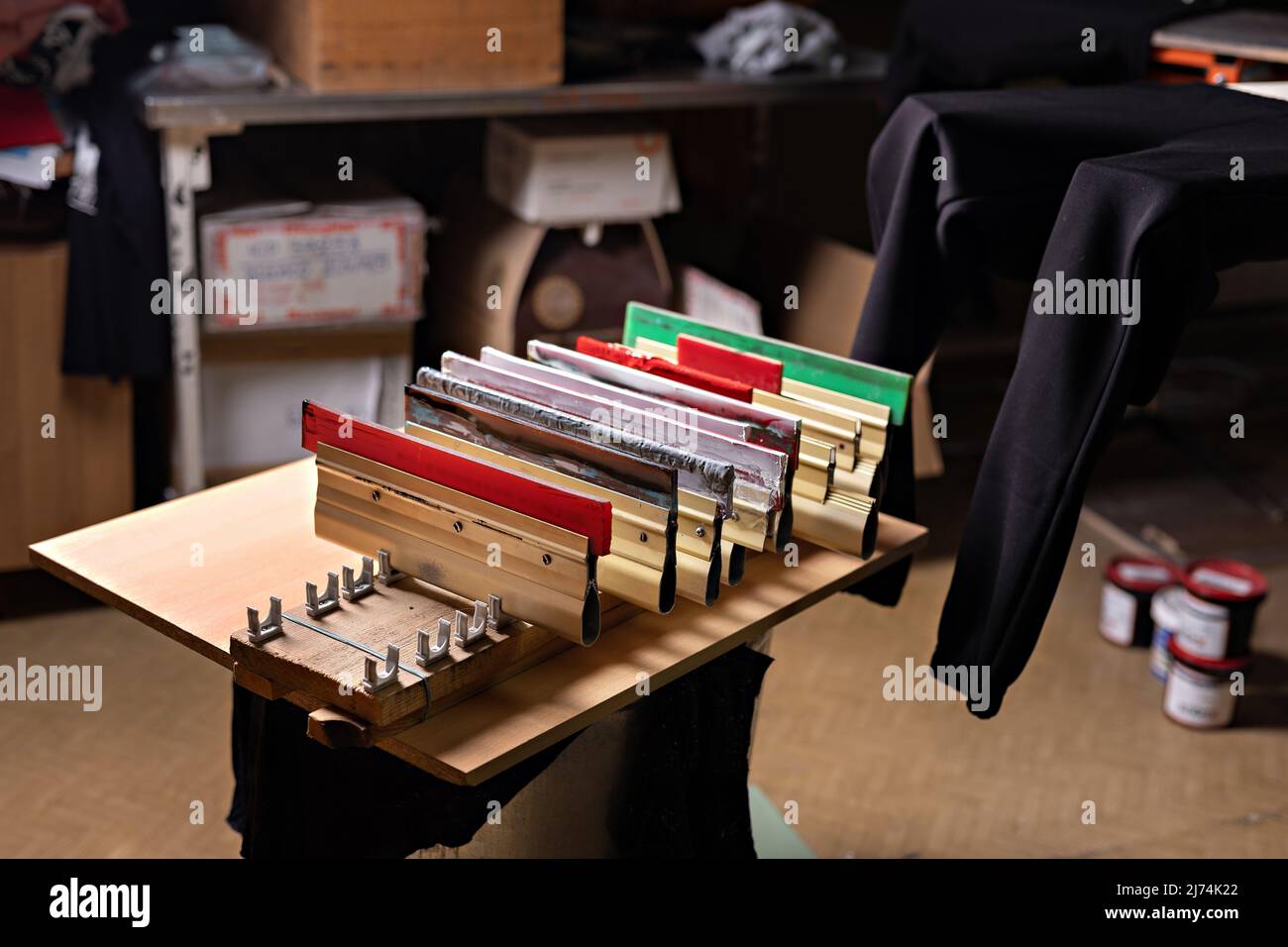 Hand pressing silk screen hires stock photography and images Alamy