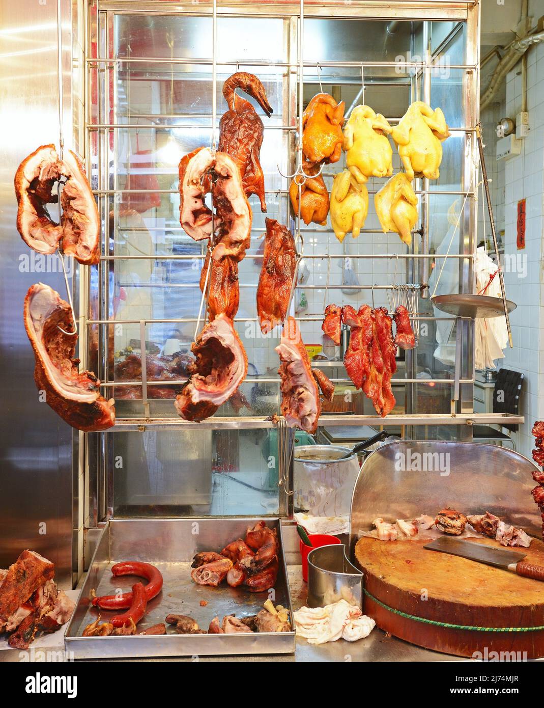 Precooked chickens, ducks and other meat at a market in Kowloon, China