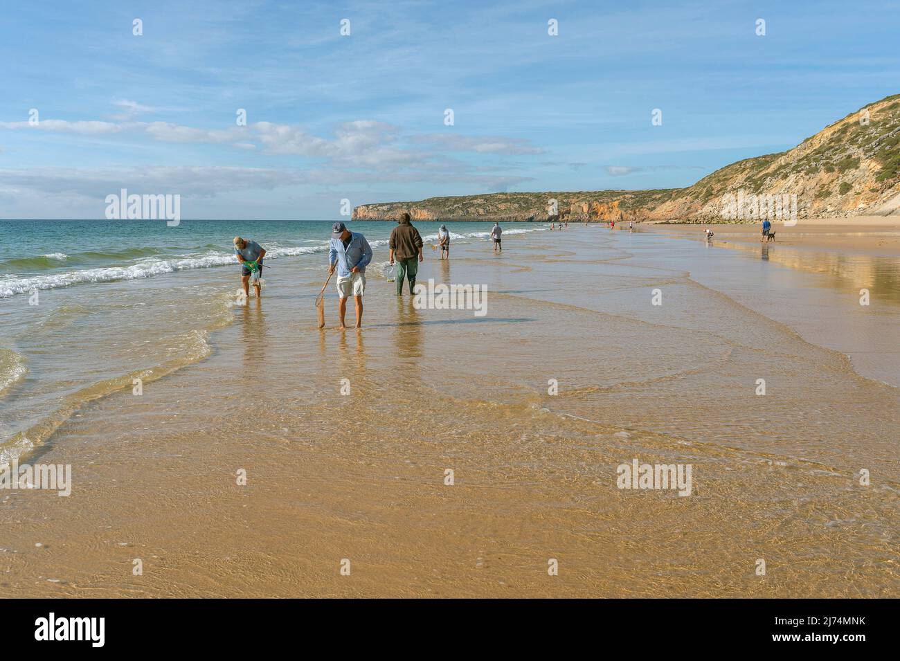 People fishing worms, crabs and other crustaceans, Portugal, Algarve Stock Photo