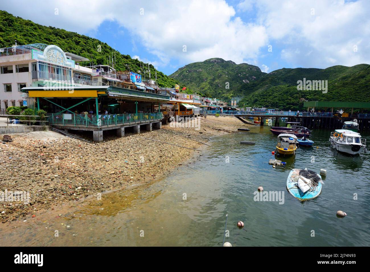 The famous seafood restaurants and the harbour of Lamma Island, China, Hong Kong Stock Photo