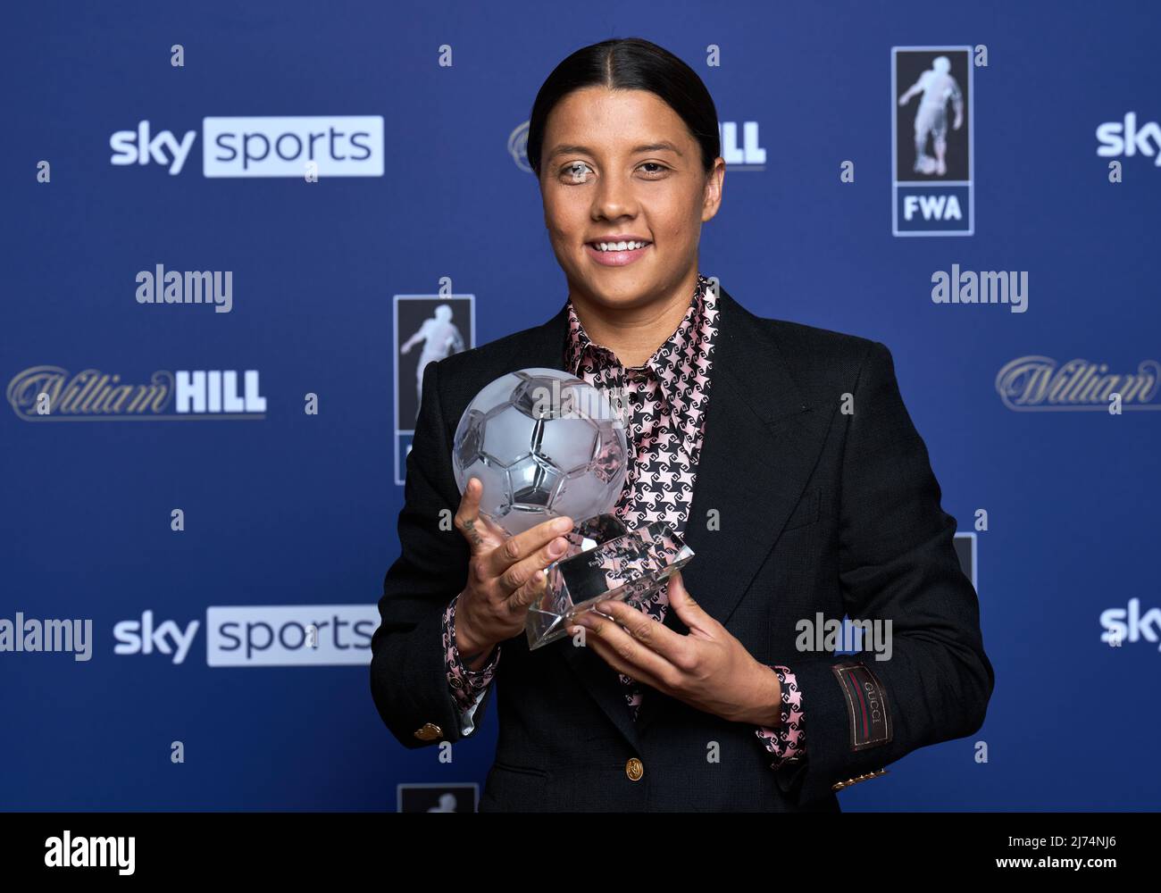Chelsea's Sam Kerr poses with their FWA Player of the Year Award during