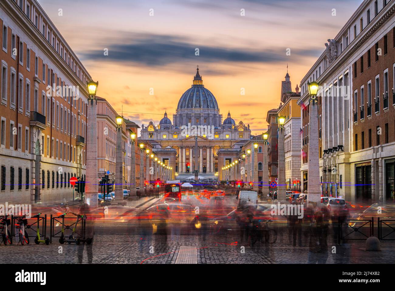 Vatican City, a city-state surrounded by Rome, Italy,  with St. Peter's Basilica at twilight. Stock Photo