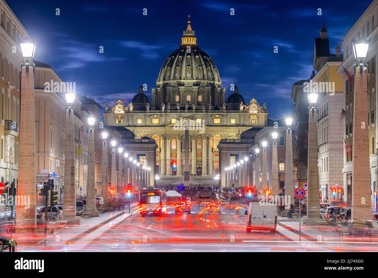 Vatican City, a city-state surrounded by Rome, Italy,  with St. Peter's Basilica at twilight. Stock Photo