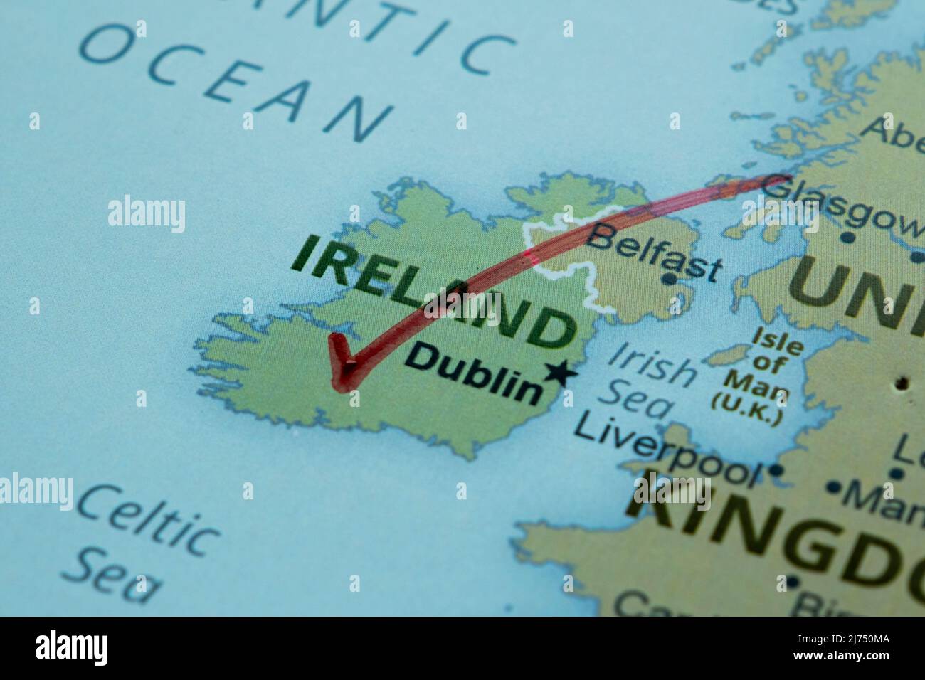 Ireland location and region on map marked with a pen, Great Britain Dublin travel idea on map with red tick, vacation and road trip concept Stock Photo