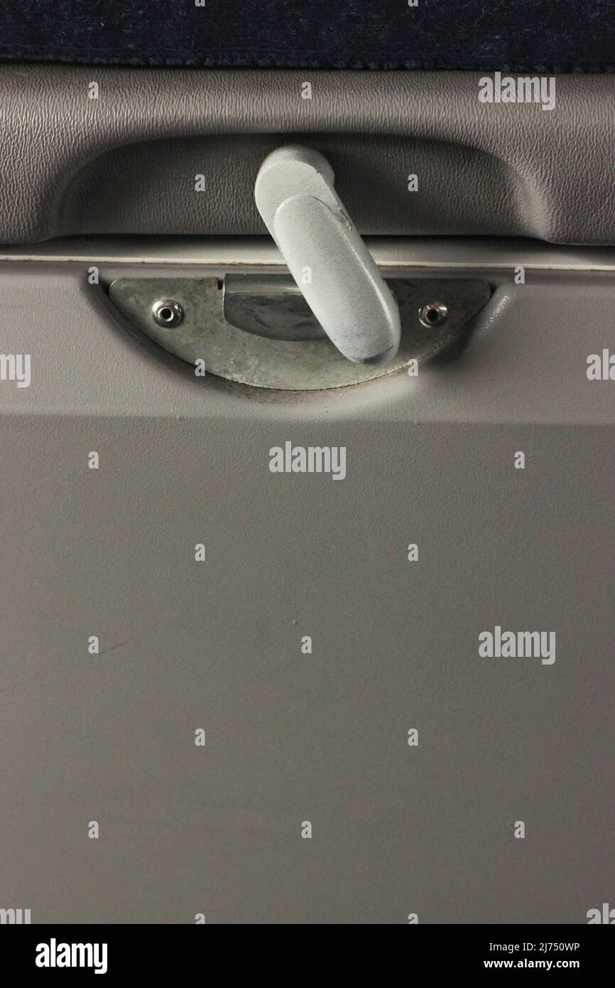 The rotating latch on a drop down tray Stock Photo Alamy