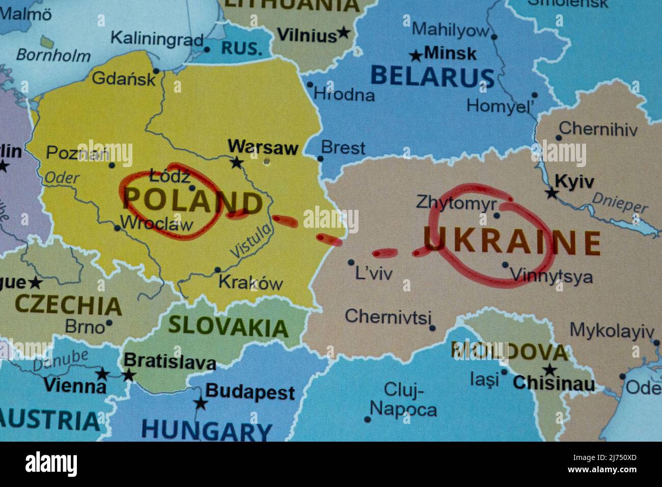 Poland and Ukraine on map marked with a pen, East Europe route on map with red pen, Ukraine war, vacation and road trip concept, Europe destination Stock Photo