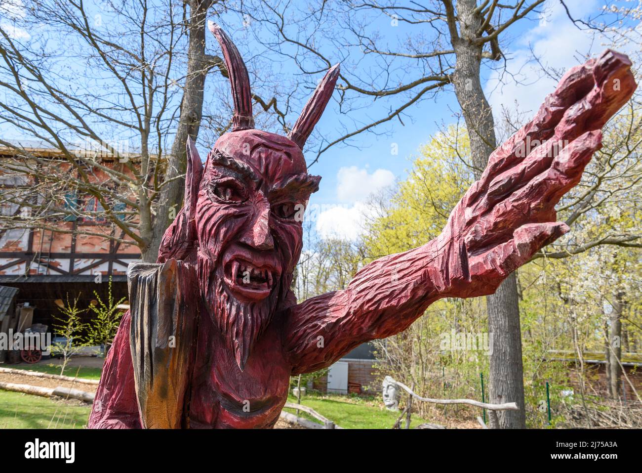 Wooden statue of the devil at Thale in Harz Mountains, Germany Stock Photo