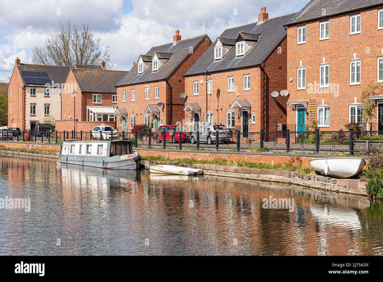 Modern waterside properties beside the restored Stroudwater Canal at