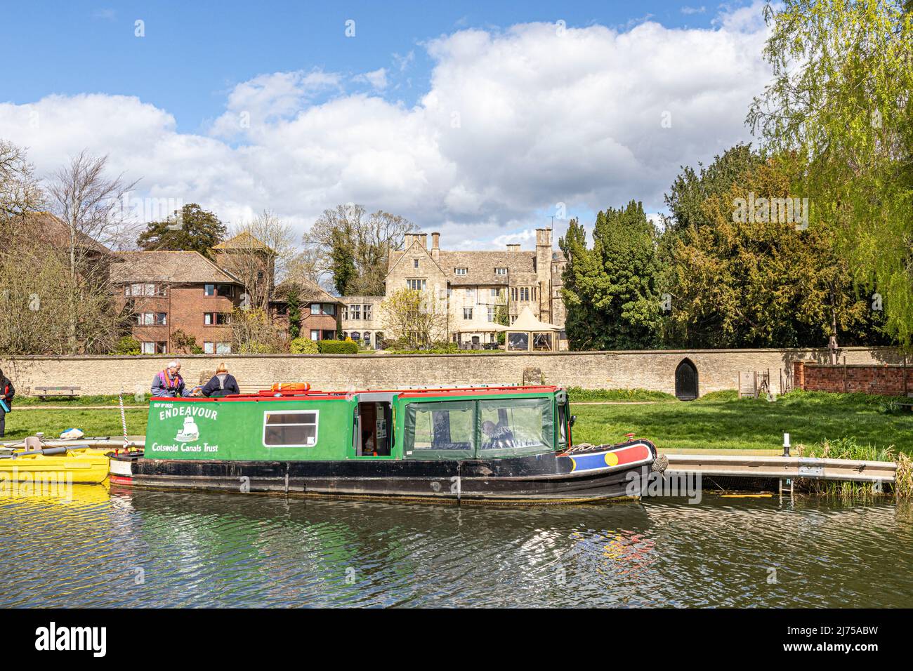 The Cotswold Canals Trust long boat Endeavour on the restored Stroudwater Canal at Stonehouse Court Hotel, Stonehouse, Gloucestershire, England UK Stock Photo
