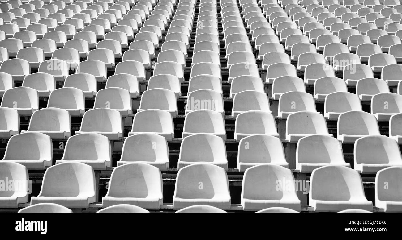 Tribune sports stadium with empty chairs Stock Photo - Alamy