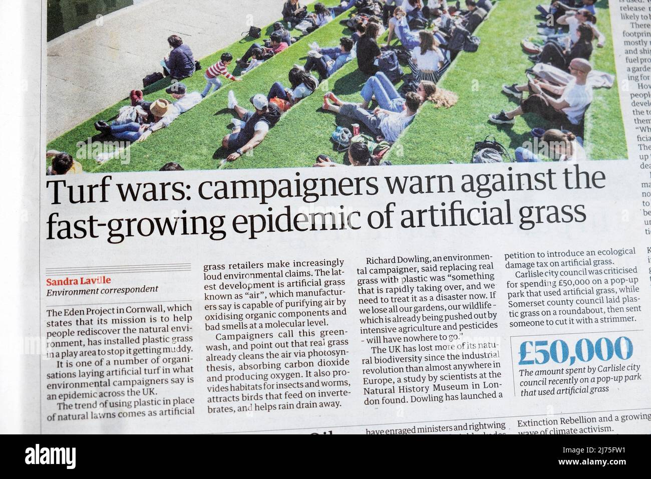 'Turf wars campaigners warn against the fast growing epidemic of artificial grass' Guardian newspaper headline article clipping April 2022 London UK Stock Photo