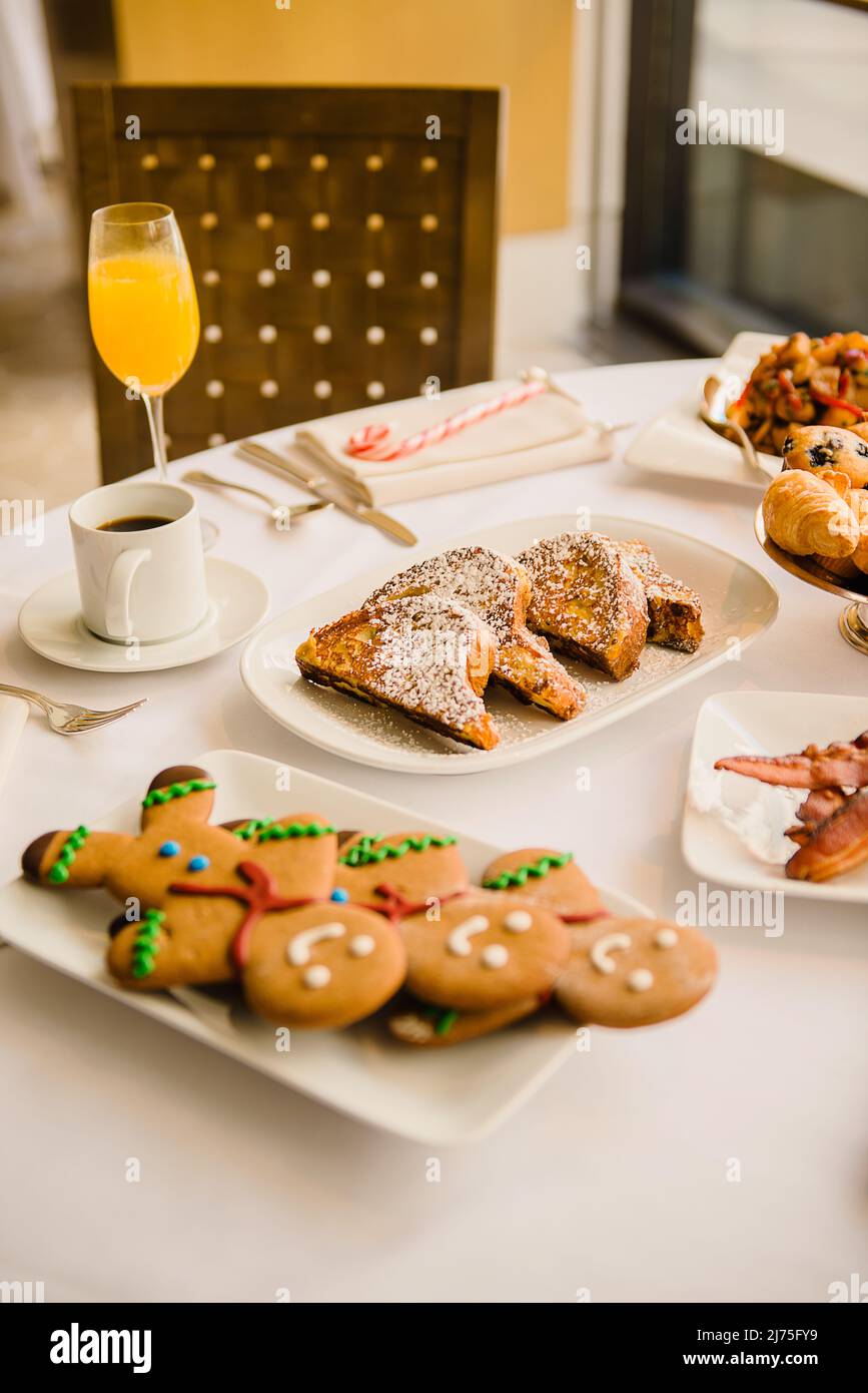 Holiday brunch with gingerbread men and French toast Stock Photo