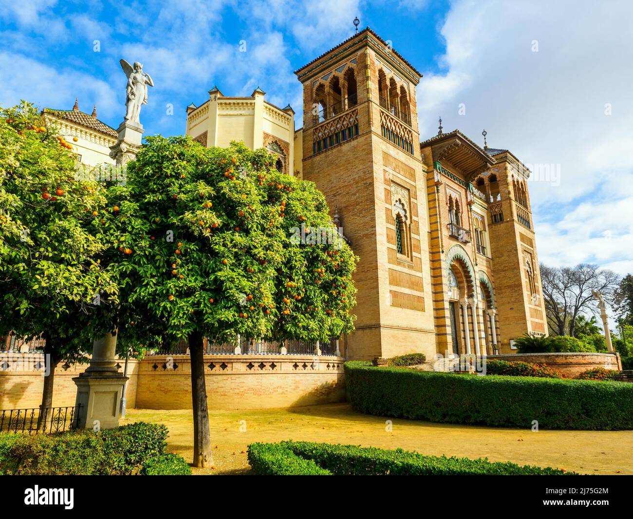 The Mudejar Pavilion designed by Anibal Gonzalez and built in 1914 houses the Museum of Arts and Popular Customs of Seville (Museo del Artes y Costumbres Populares) in Maria Luisa Park - Seville, Spain Stock Photo