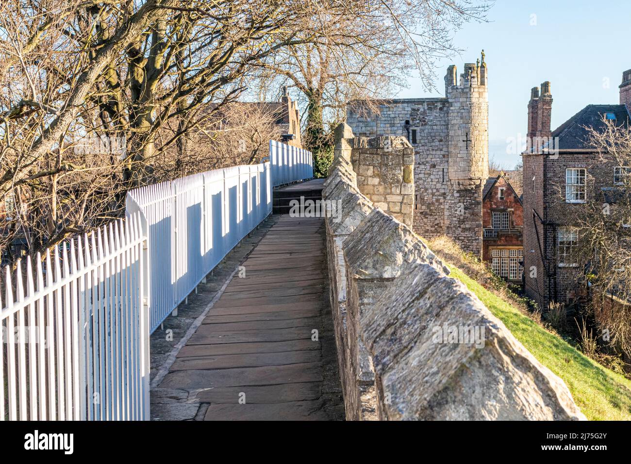 Micklegate Bar on the walkway in winter around the city walls of York, Yorkshire, England UK Stock Photo