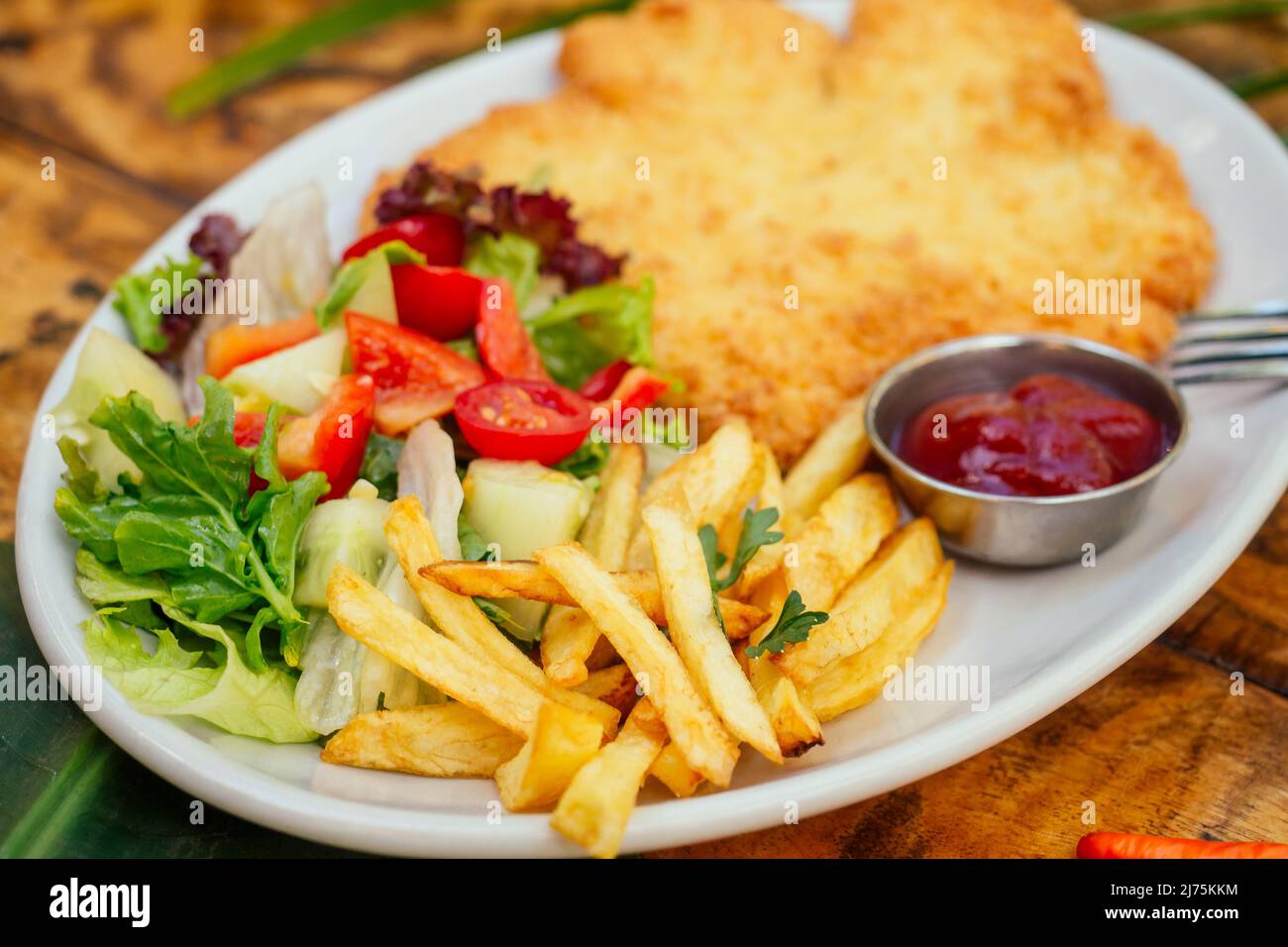 potato pancakes and salad on tropics resort exotic spa Stock Photo