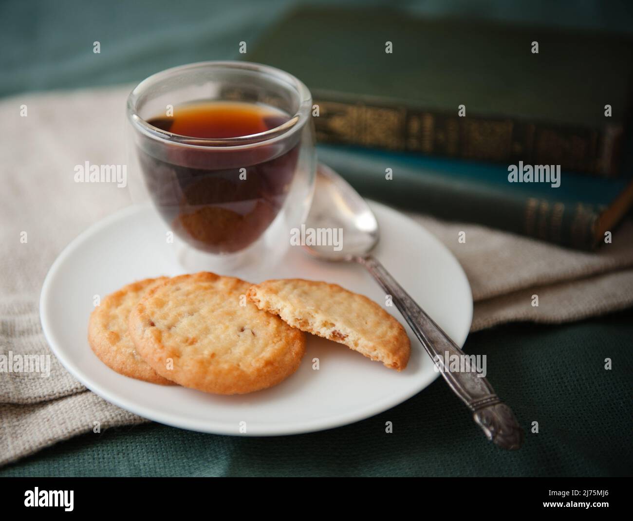 Espresso in a glass with biscuits Stock Photo
