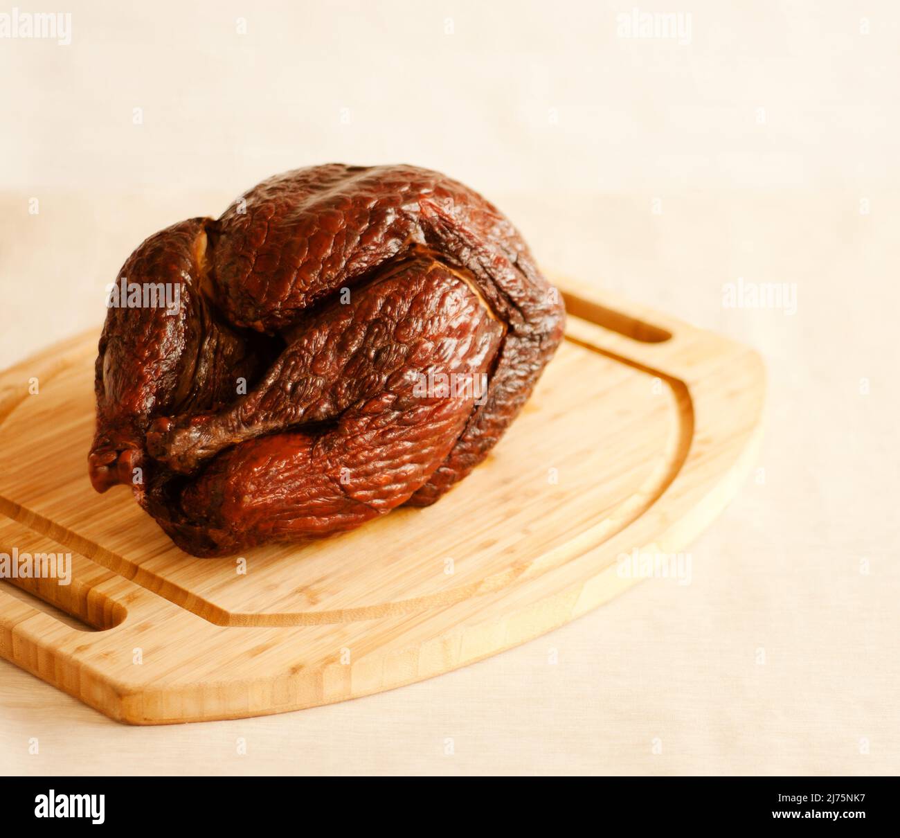 Whole Smoked Turkey on a Cutting Board Stock Photo Alamy