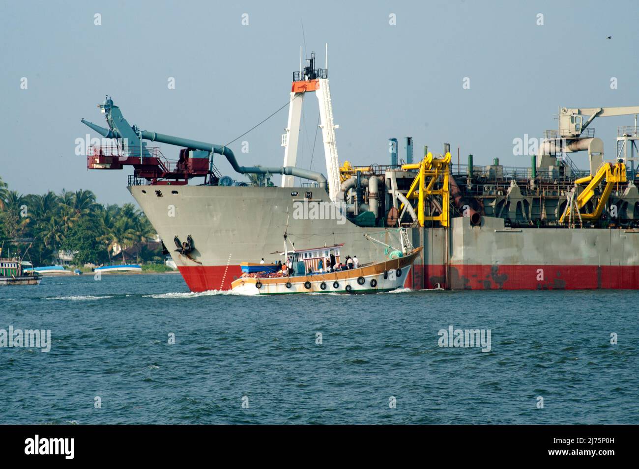 Huge cargo ship entering the Koch port for cargo loading and unloading