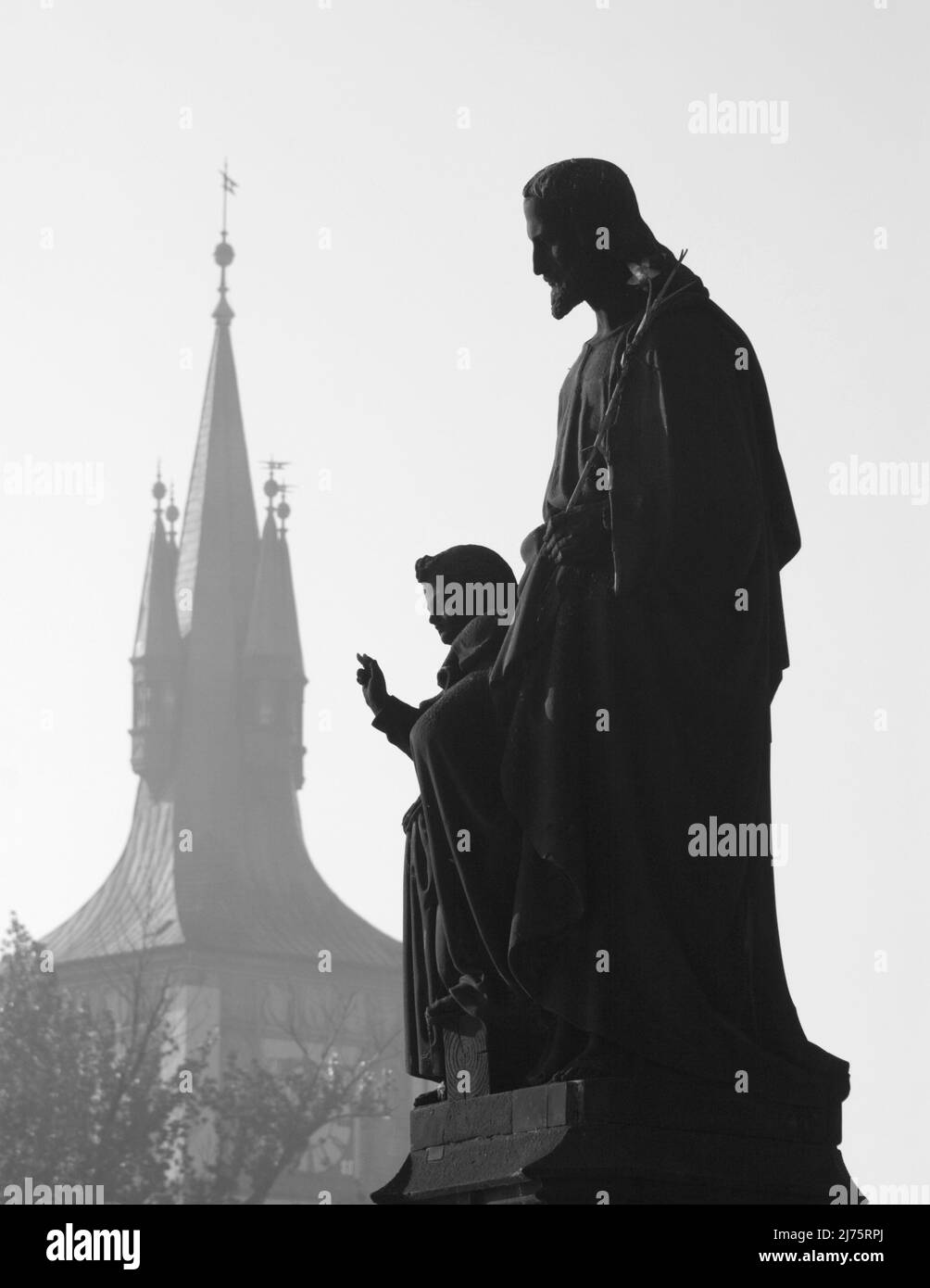 The silhouette of statue of St. Joseph from Charles bridge in Prague by Josef Max originally from year 1706 current statue 1854. Stock Photo