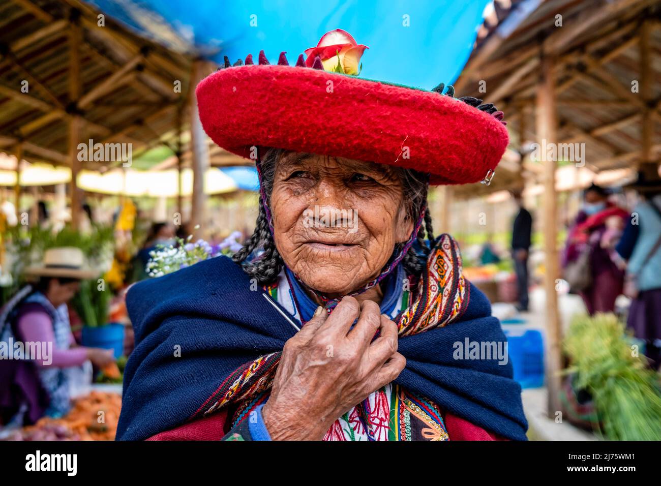 A Portrait Of A Senior Indigenous Quechua Woman At The Sunday Market In