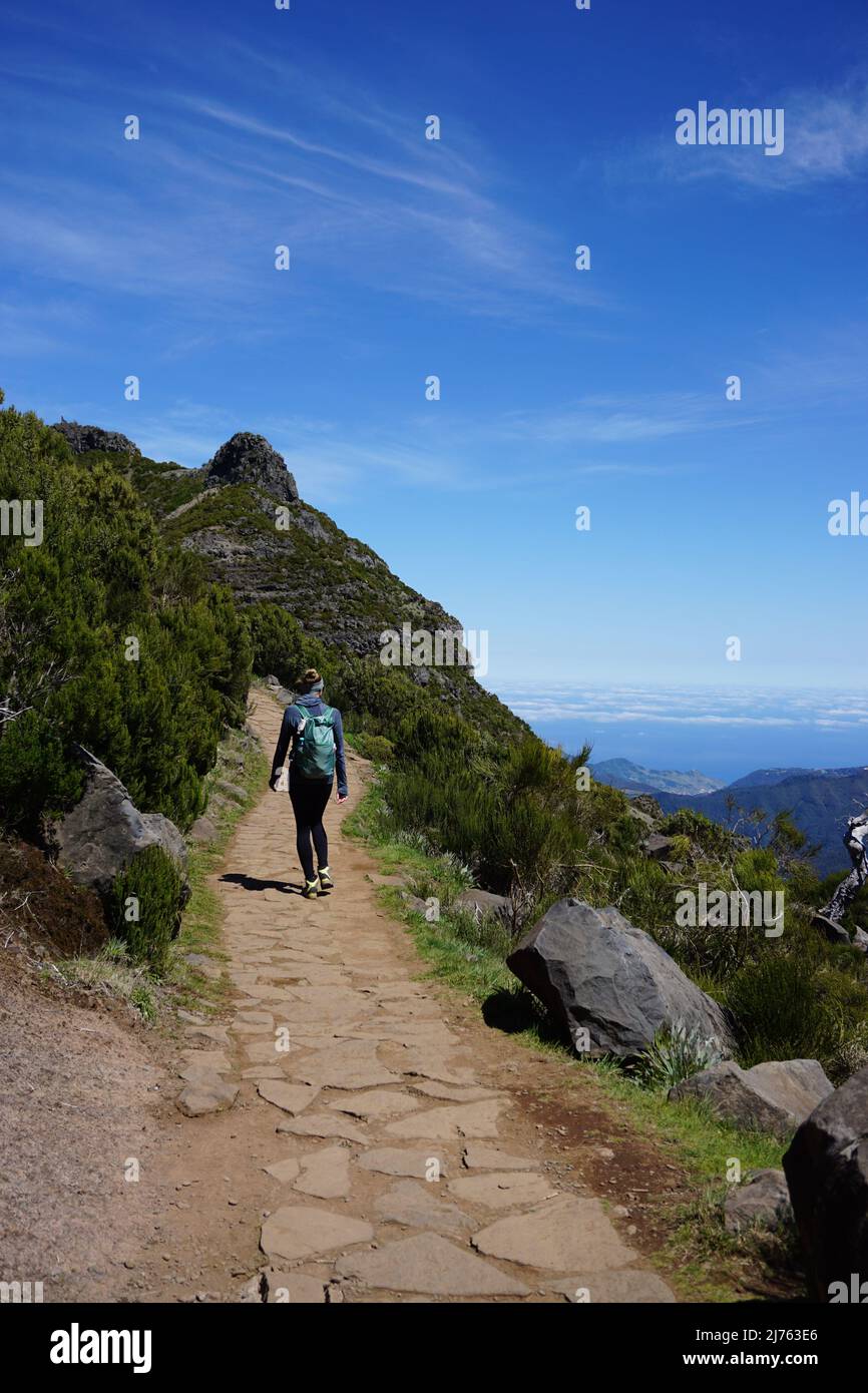 Rural hiking trail from Pico Ruivo to Pico Arieiro through the volcanic mountain range on the island of Madeira, Portugal, Europe. Photo by Matheisl Stock Photo