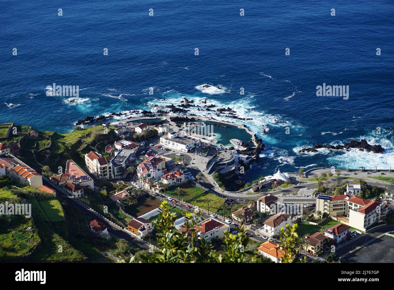 Aerial view of Porto Moniz. North on Madeira and the natural swimming pools created by lava lakes and the Atlantic Ocean, Portugal. Photo Matheisl Stock Photo
