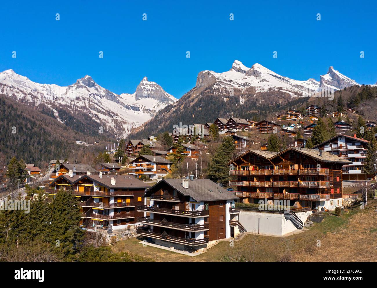 Chalets with apartments in the vacation and spa resort of Ovronnaz, Valais, Switzerland Stock Photo