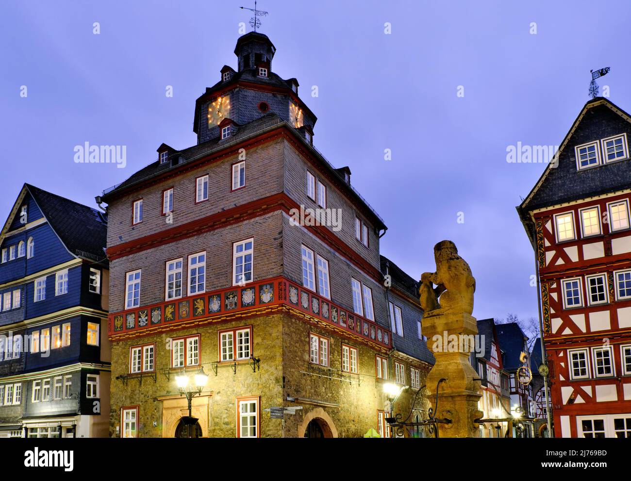 Europe, Germany, Hesse, city of Herborn, historical old town, Christmas, Christmas lights, town hall at market place, lion fountain Stock Photo