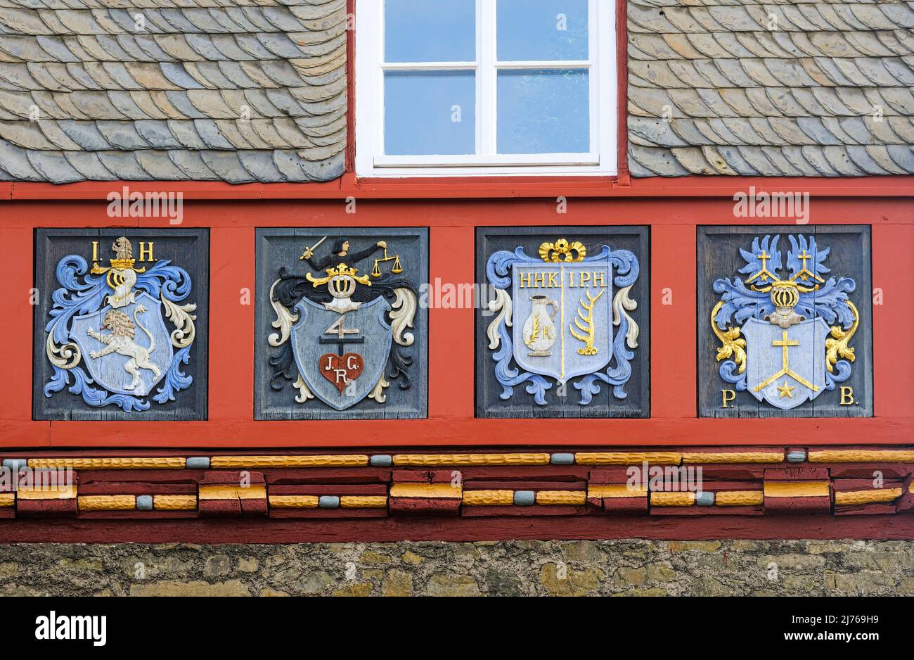 Europe, Germany, Hesse, city of Herborn, historical old town, civic coat of arms frieze on town hall Stock Photo