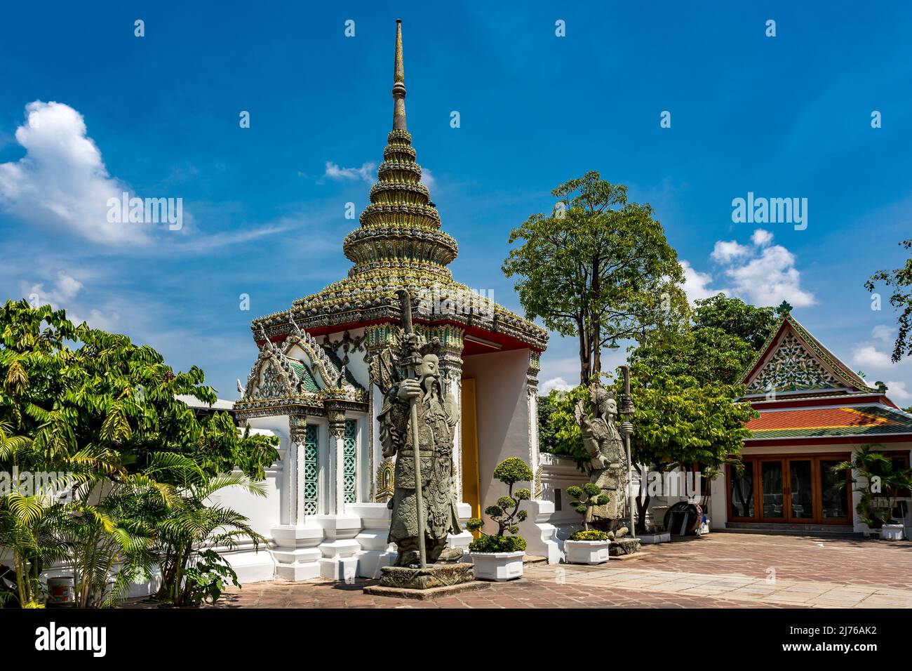 Entrance gate protected by Chinese stone figures, temple guardians, temple complex Wat Pho, Temple of the Reclining Buddha, Bangkok, Thailand, Asia Stock Photo