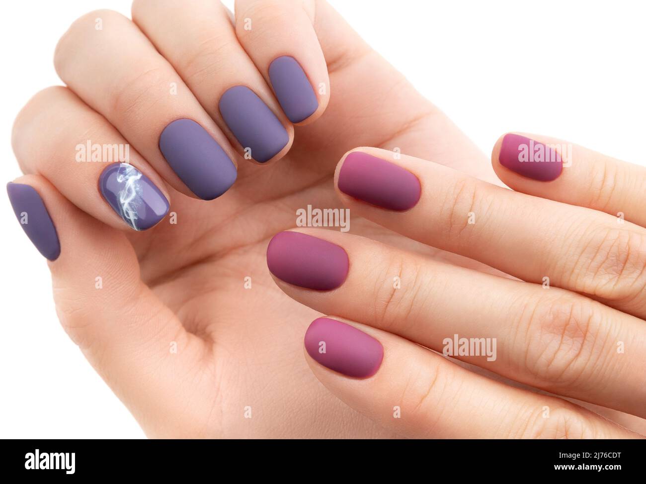 Beautiful purple burgundy matte manicure on white background Stock Photo -  Alamy